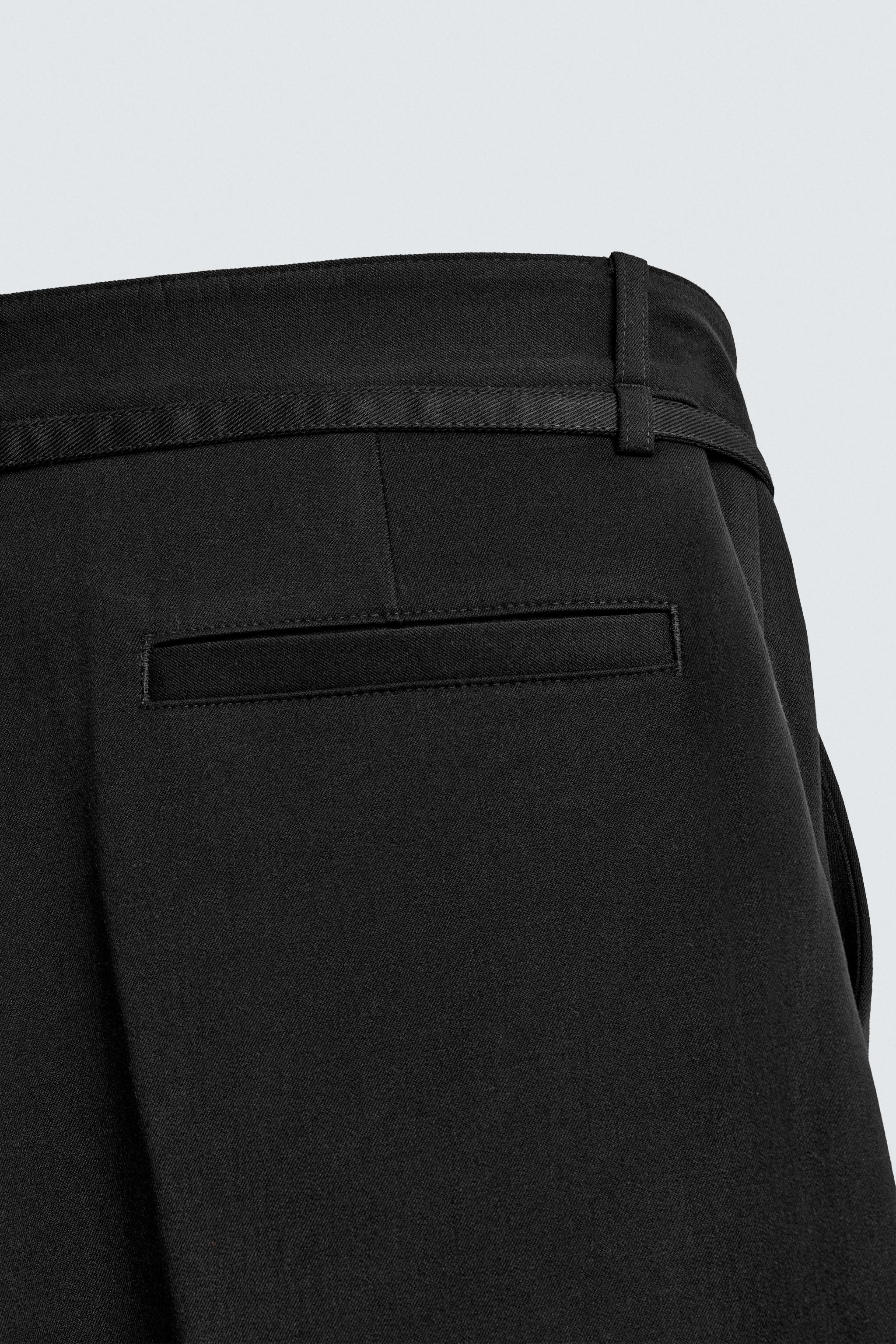 BALLOON PLEATED BELTED PANTS